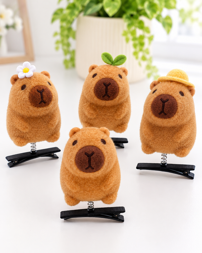 Gancho para cabello de peluche con diseño de capibara